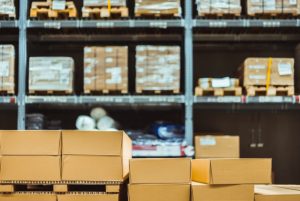 "Stack of cardboard boxes in smart warehouse industry logistic. Premium Photo"